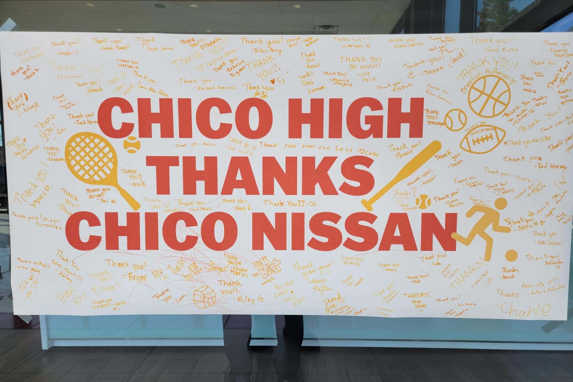A sign reading Chico High Thanks Chico Nissan
